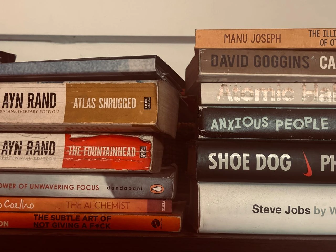 A stack of books seen spine-on